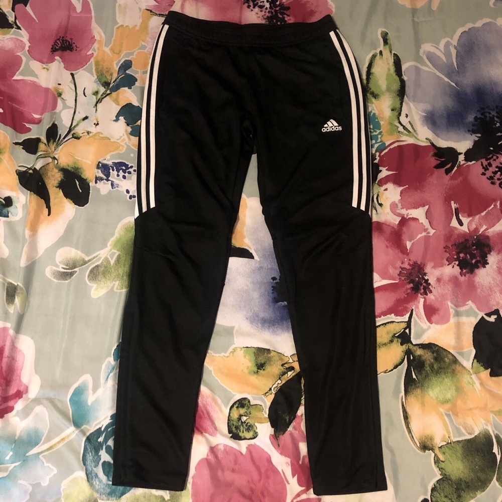 Black joggers with white stripes